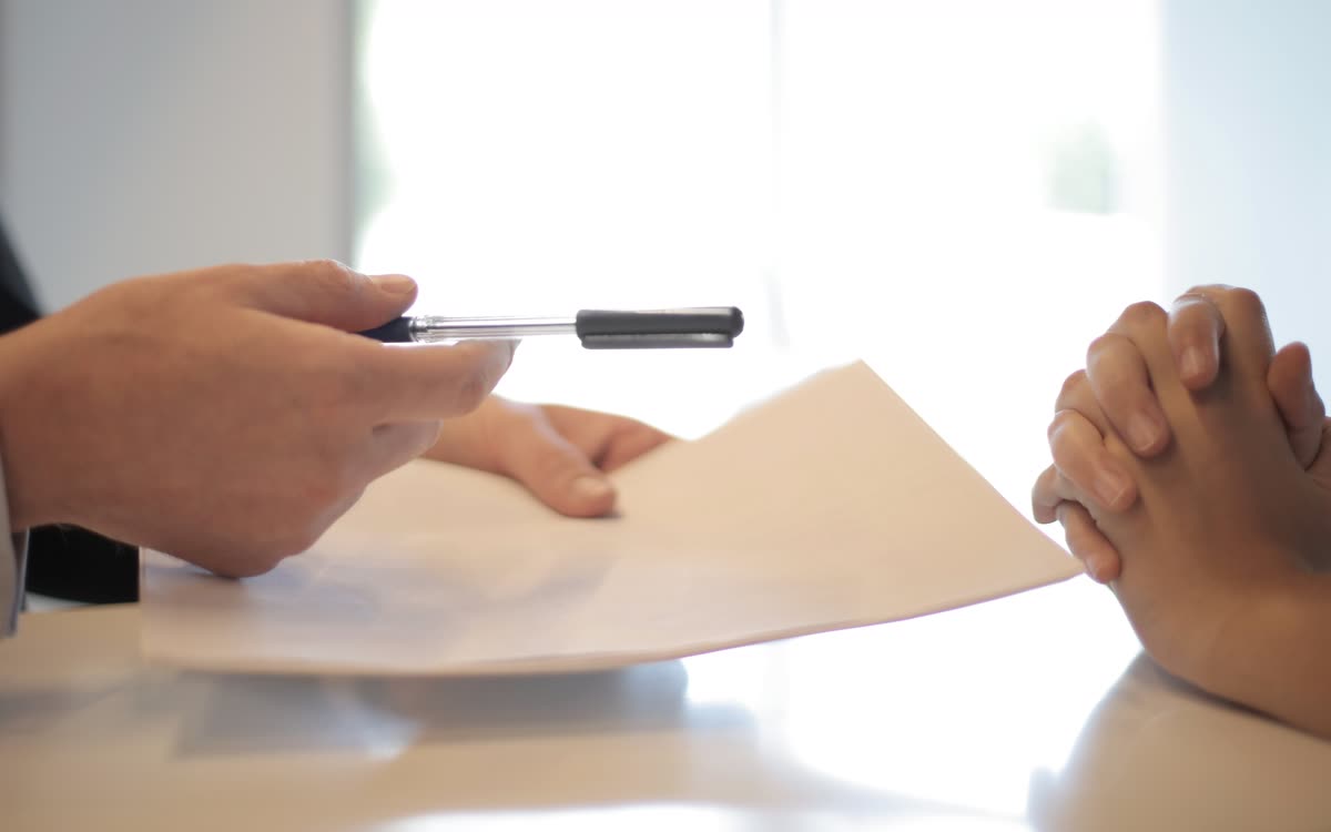 Insurance advisor reviewing coverage options with a client